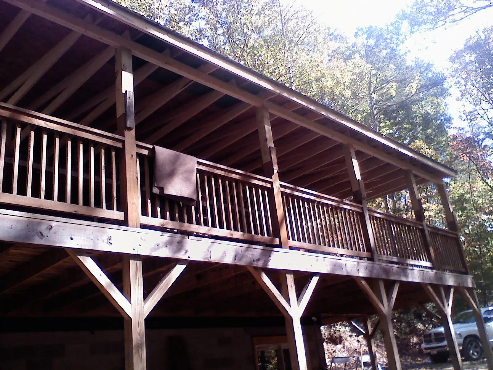Timber framing under a new elevated porch and deck — Roof Leak Repair in Gilbert by Roofing Brothers